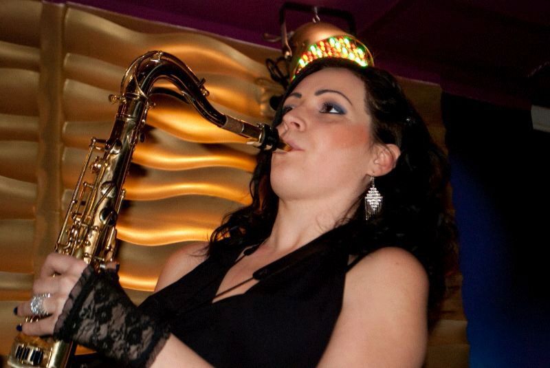 female saxophone player pune